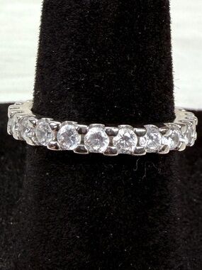 Elegant Silvertone Clear bling sz 5 eternity band Ring